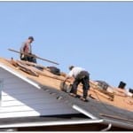 Men repairing a roof
