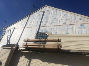 Siding installation in progress