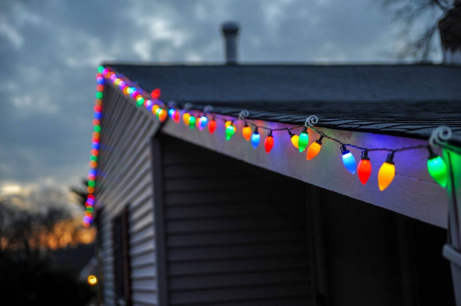 How To Hang Christmas Lights and Remove Them Without Damaging Your Roof outdoor-door-garland