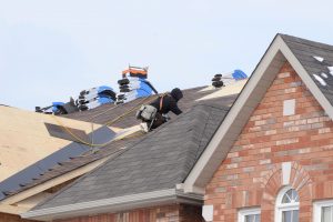 roofer on the job in warm clothing