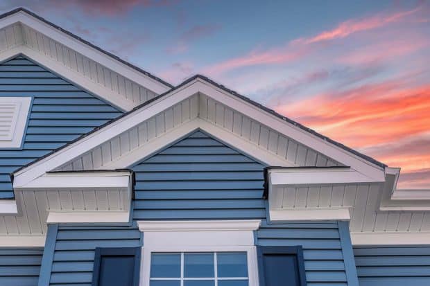 home with blue vinyl siding